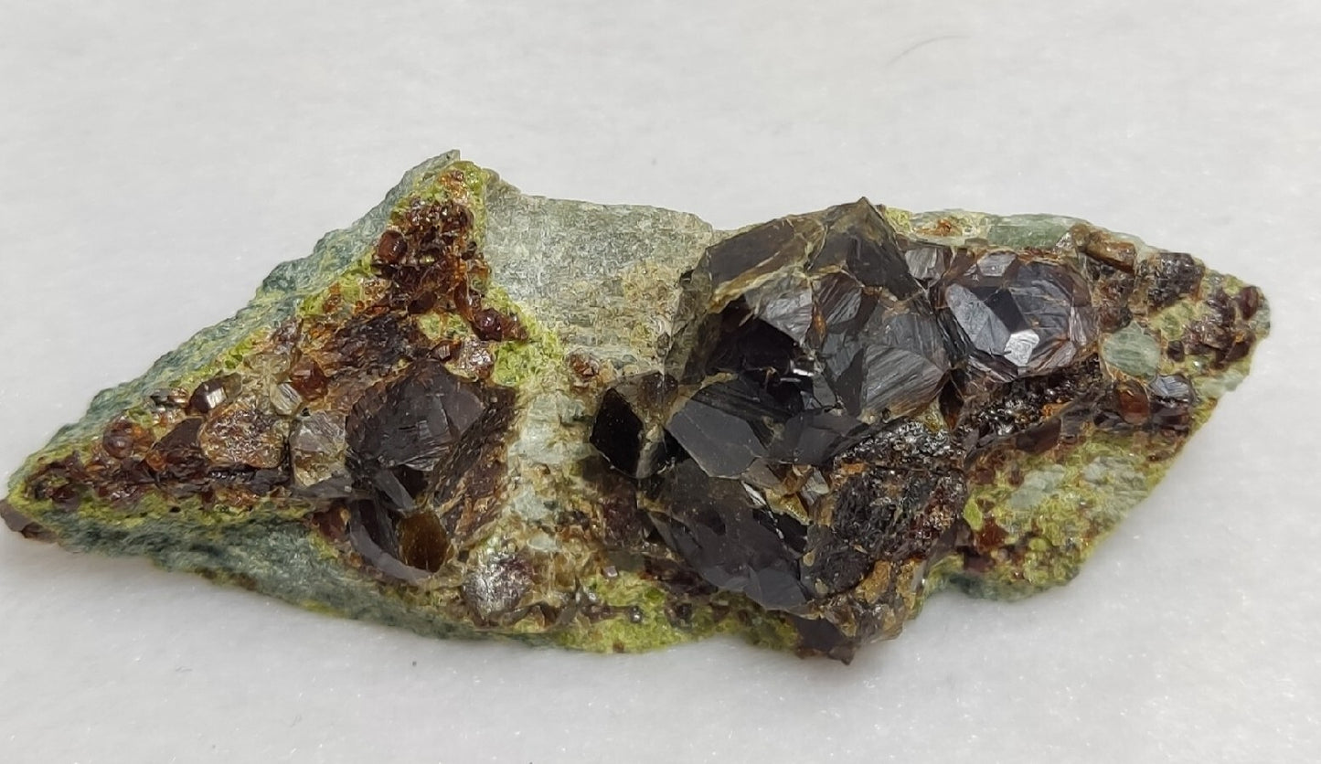 Andradite garnets on matrix with epidote 43 grams