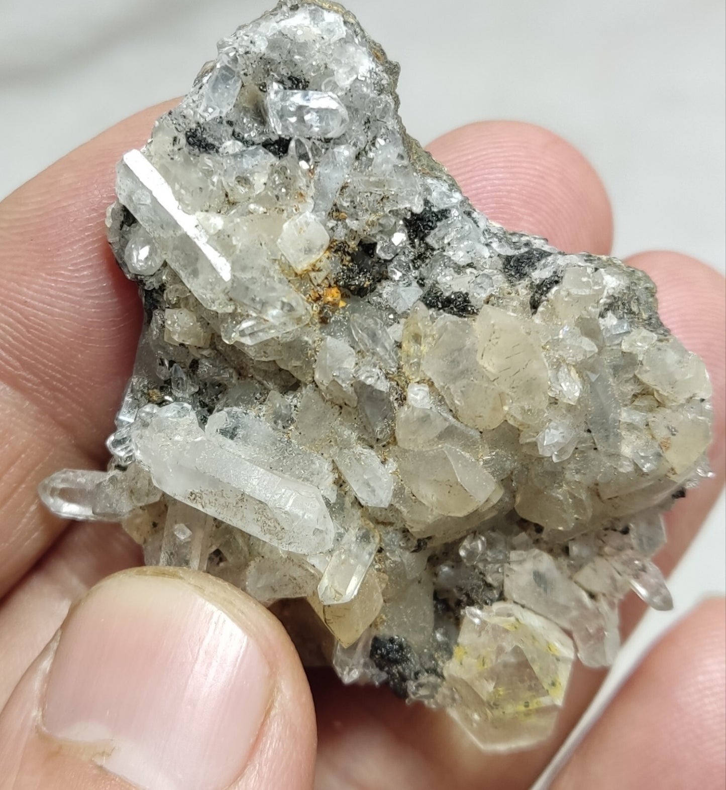 An Aesthetic quartz/calcite crystal specimen with petroleum inclusions 28 grams