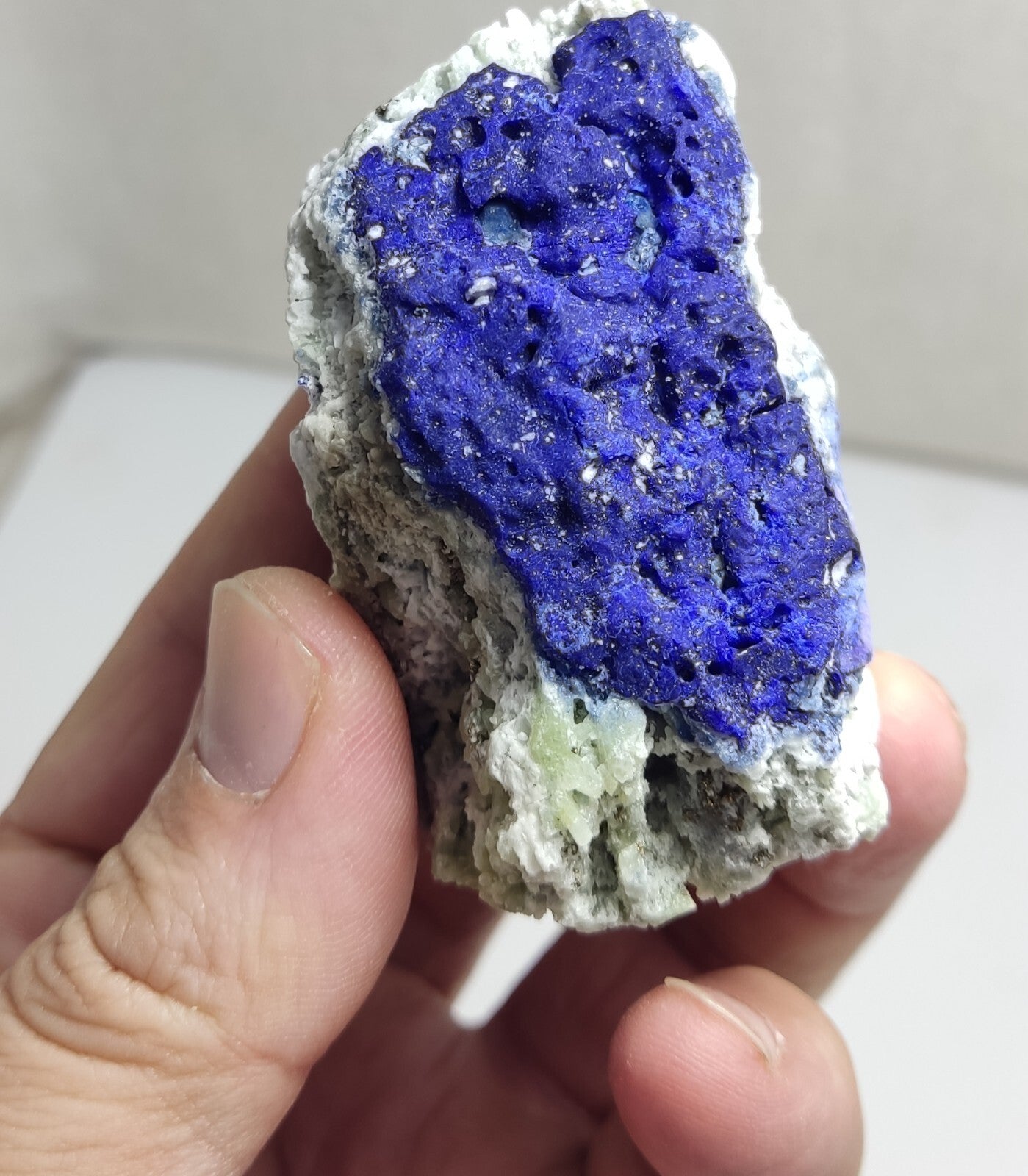 An Aesthetic specimen of fluorescent Lazurite with pyrite 181 grams