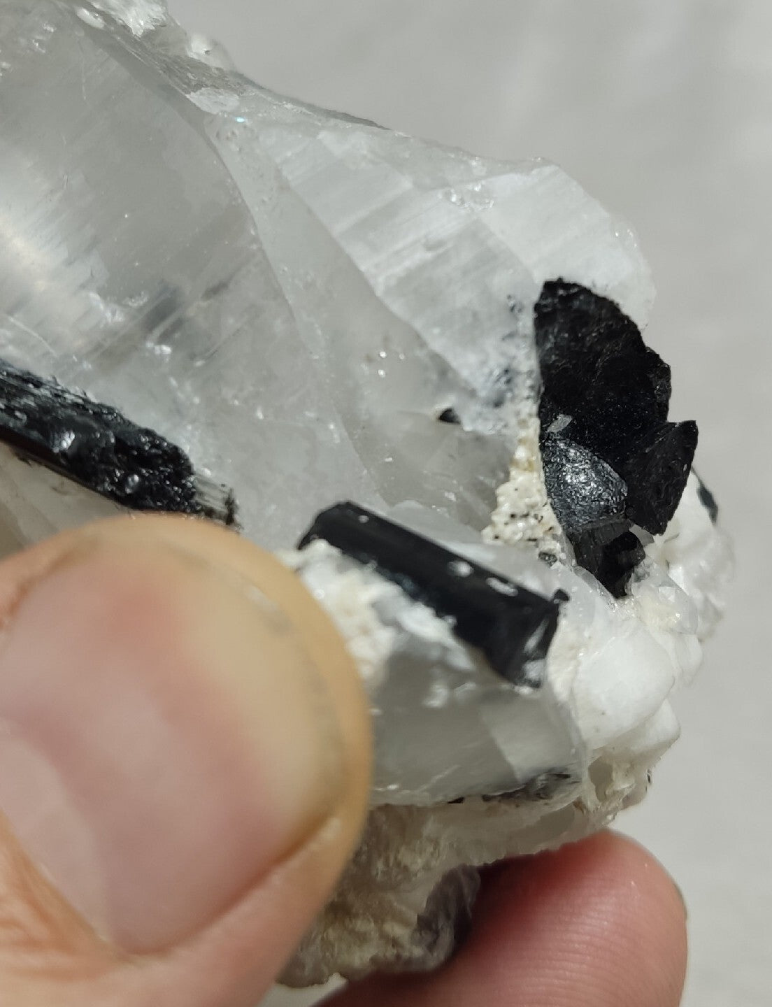 Natural quartz crystal with black tourmaline 145 grams