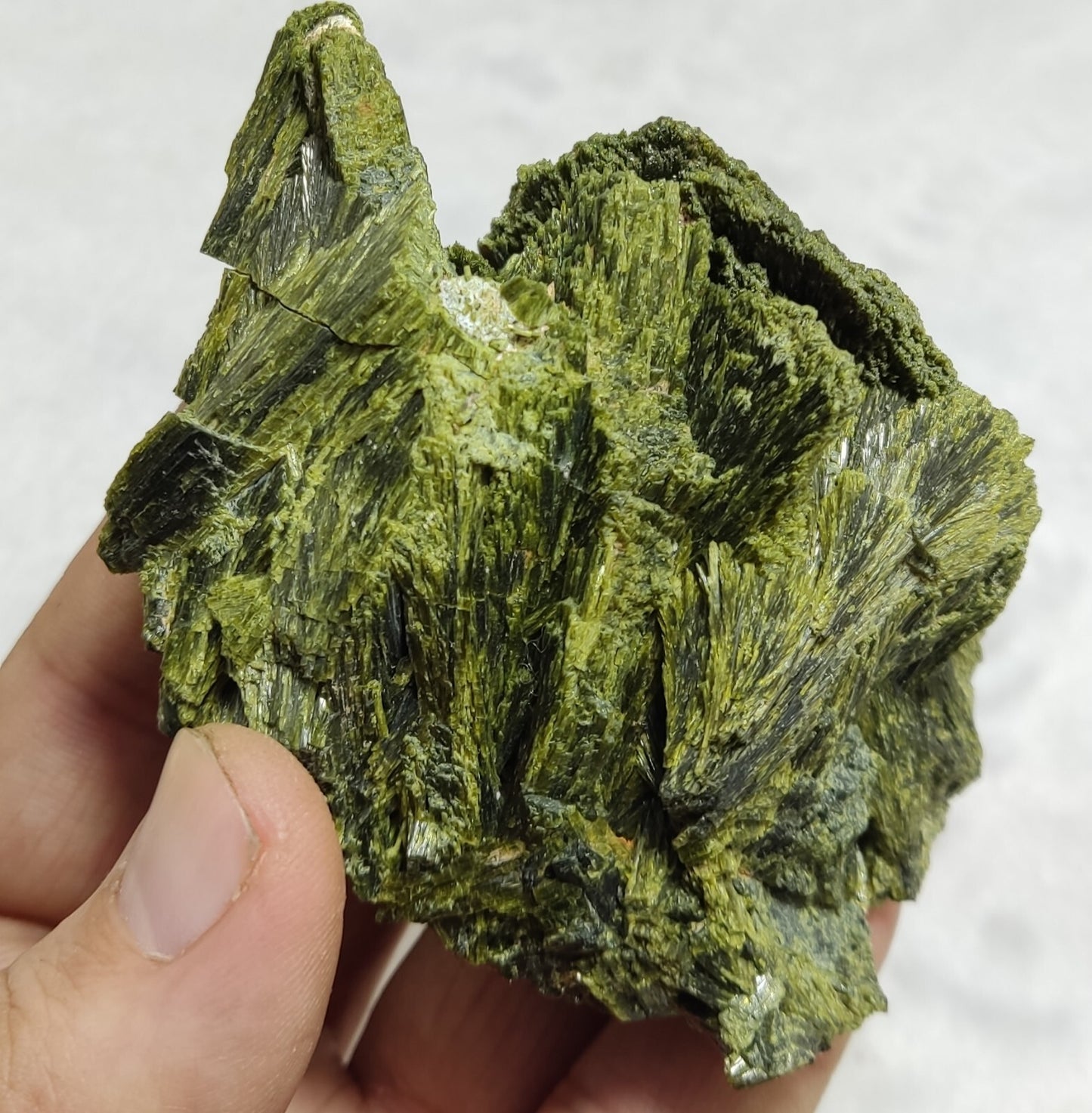 An aesthetic specimen of epidote crystal cluster 208 grams