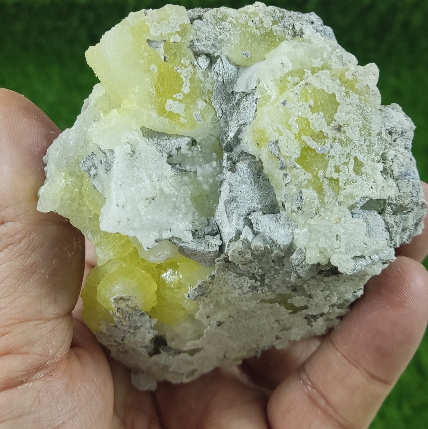 175 grams yellow color brucite specimen with Chromite