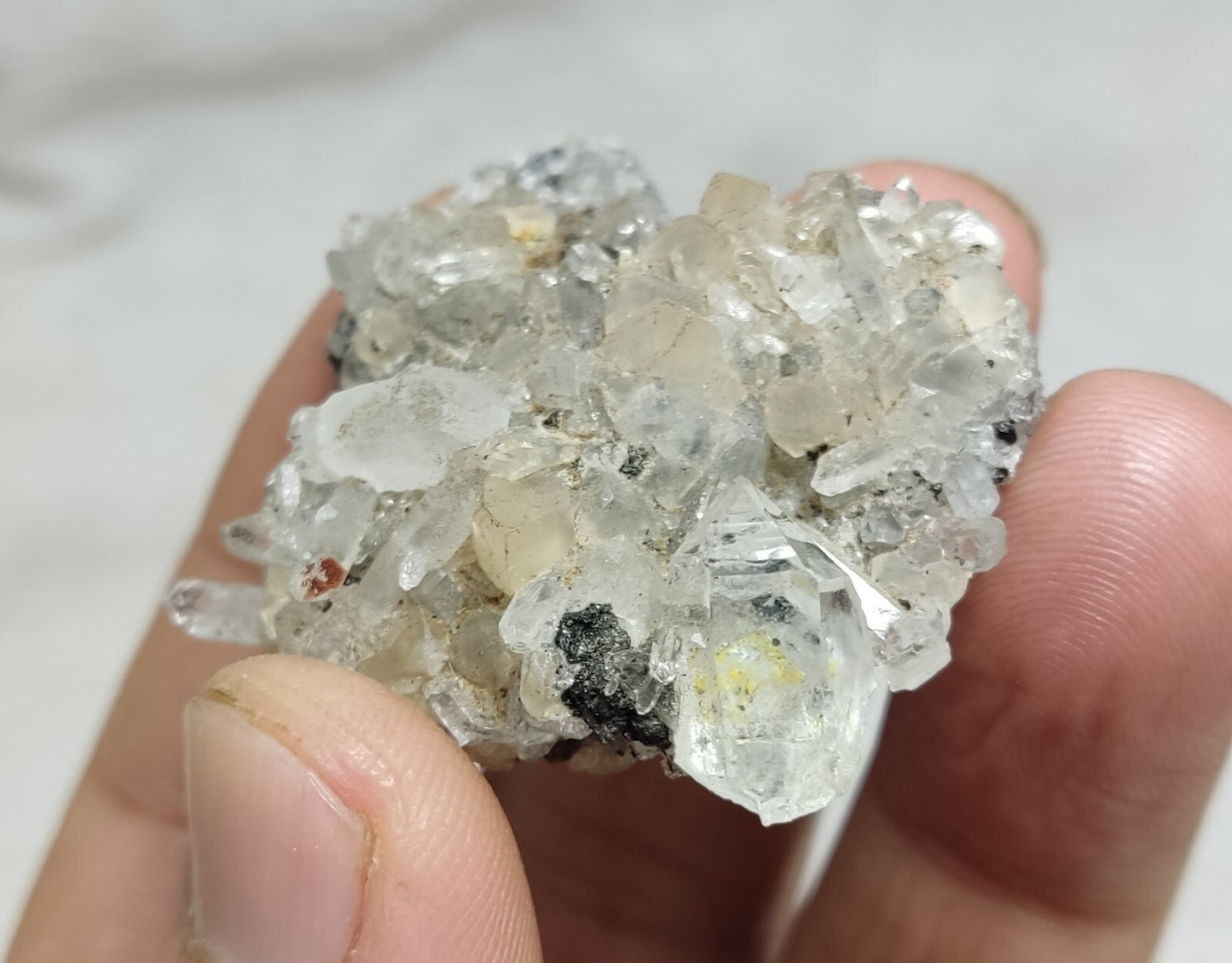 An Aesthetic quartz/calcite crystal specimen with petroleum inclusions 28 grams