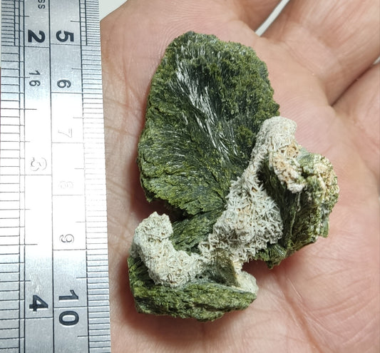 An aesthetic specimen of epidote crystal spray type 34 grams