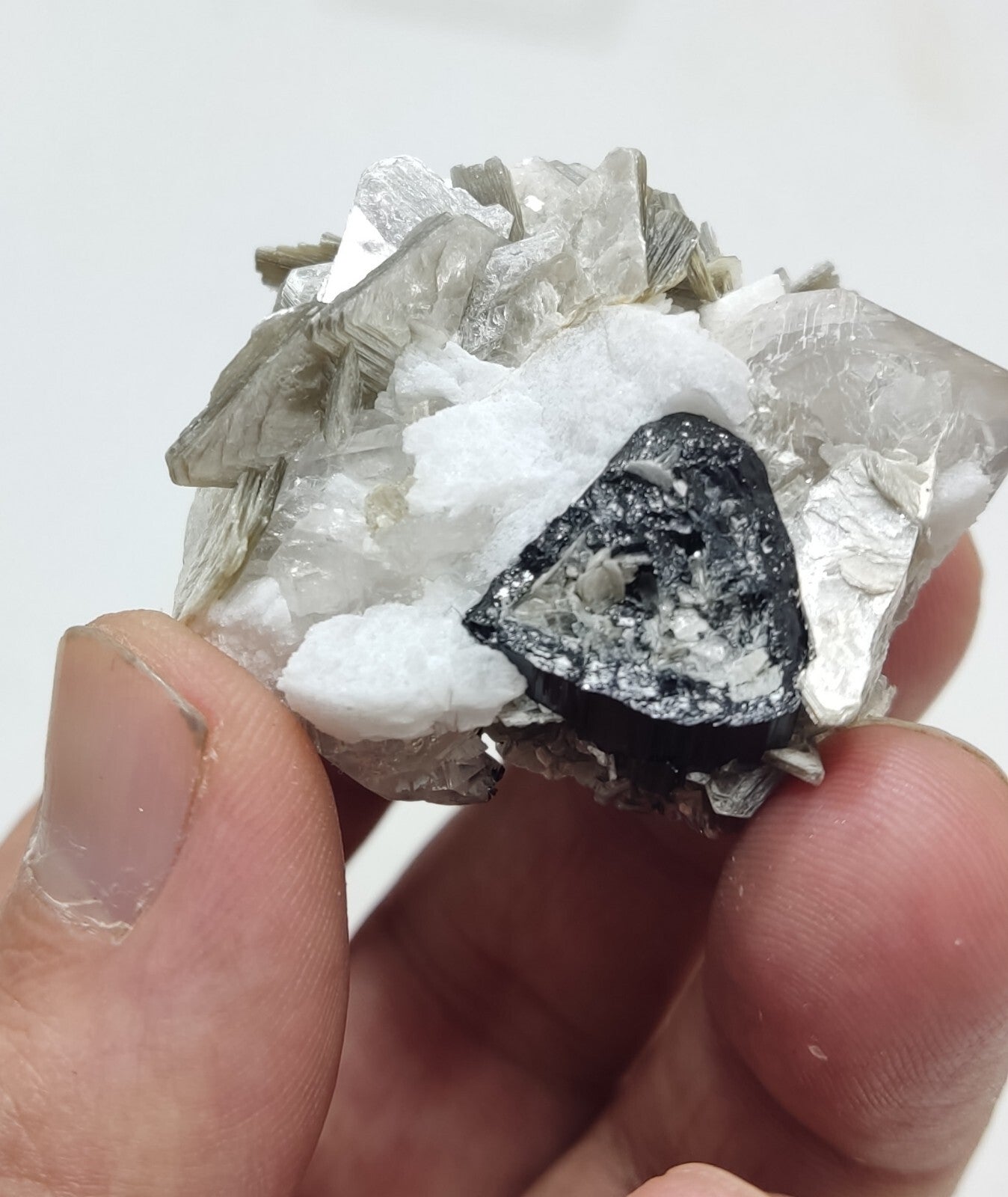 An Aesthetic specimen of muscovite with quartz, Tourmaline and albite 49 grams