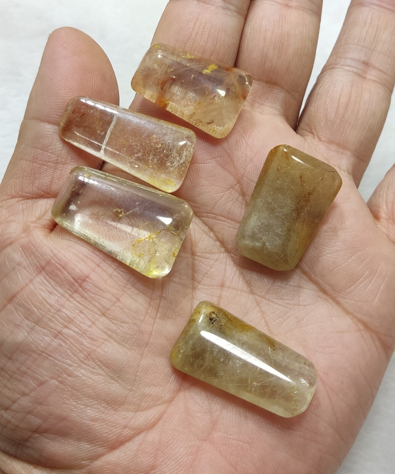 An amazing lot of Rutilated polished quartz tumbles 48 grams
