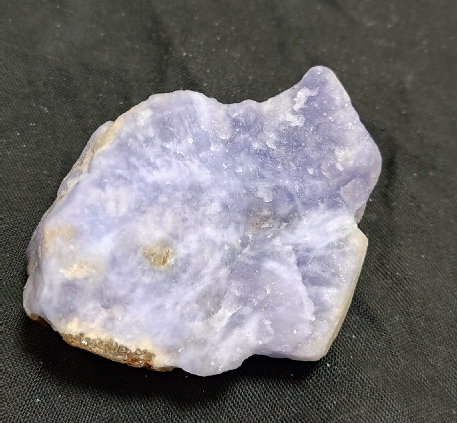 An amazing specimen of rough hackmanite chunk highly Tenebrescent 62 grams