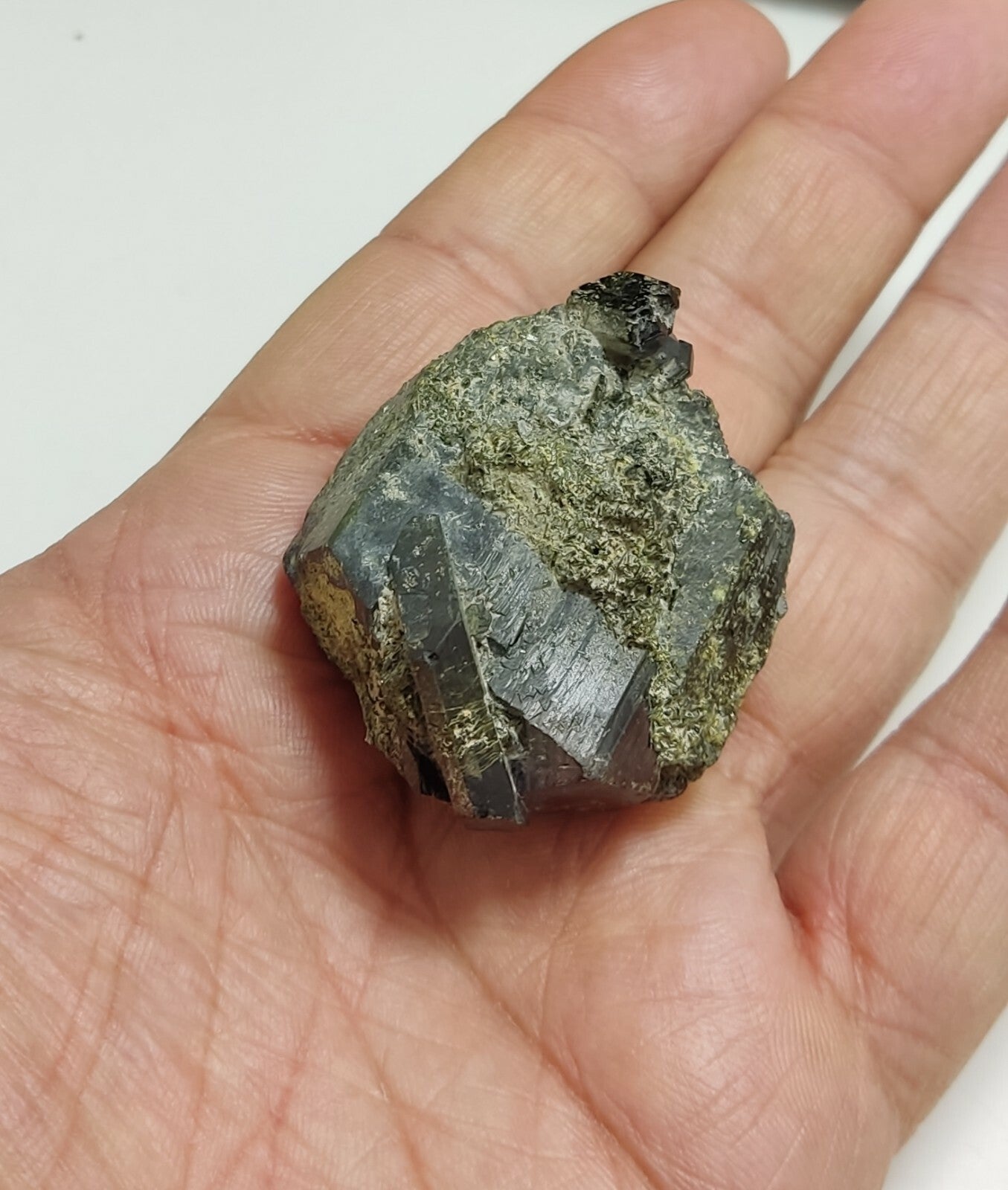 An aesthetic specimen of dark green color Epidote crystals 79 grams