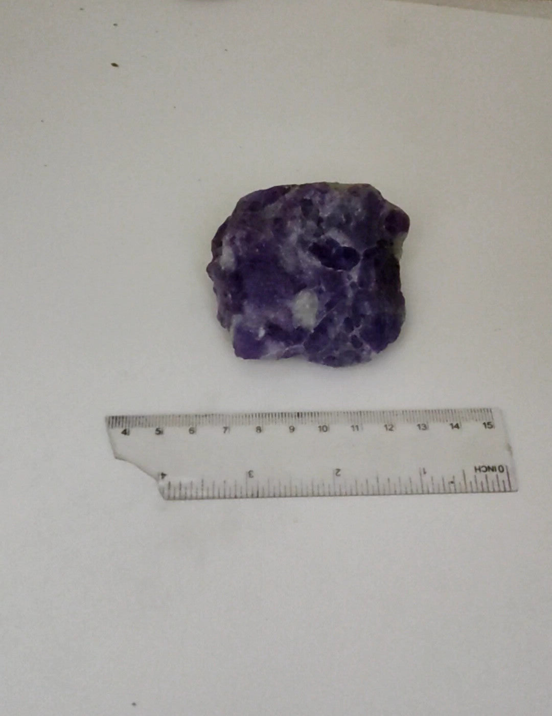 An amazing specimen of hackmanite highly Tenebrescent 143 grams