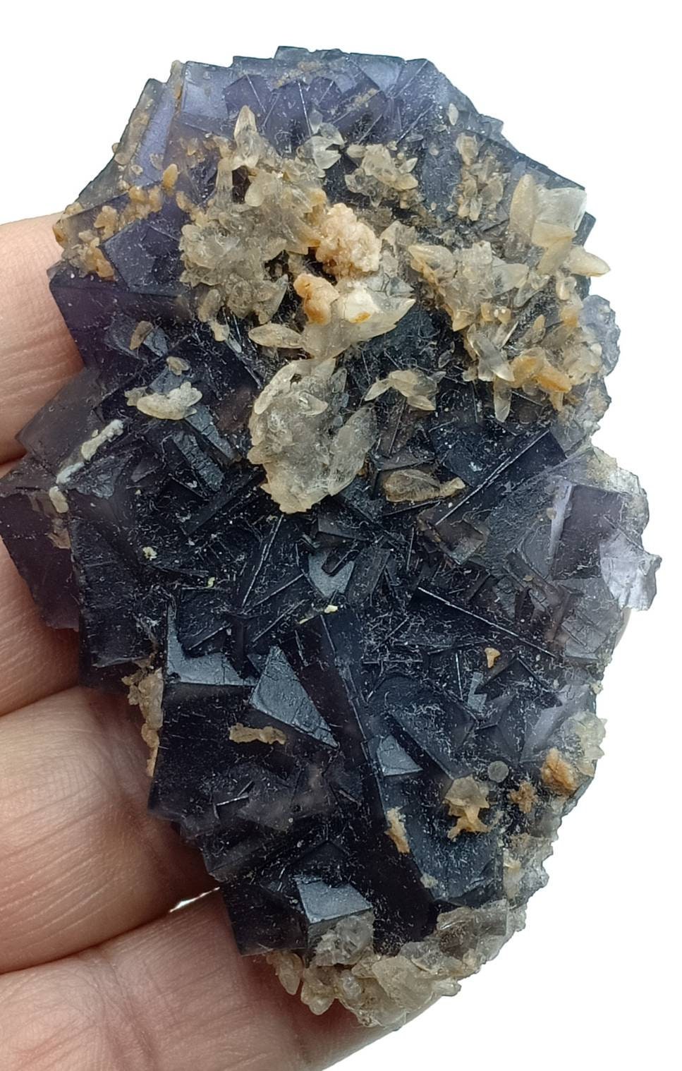 Single natural purple Fluorite with Calcite on top 152 grams