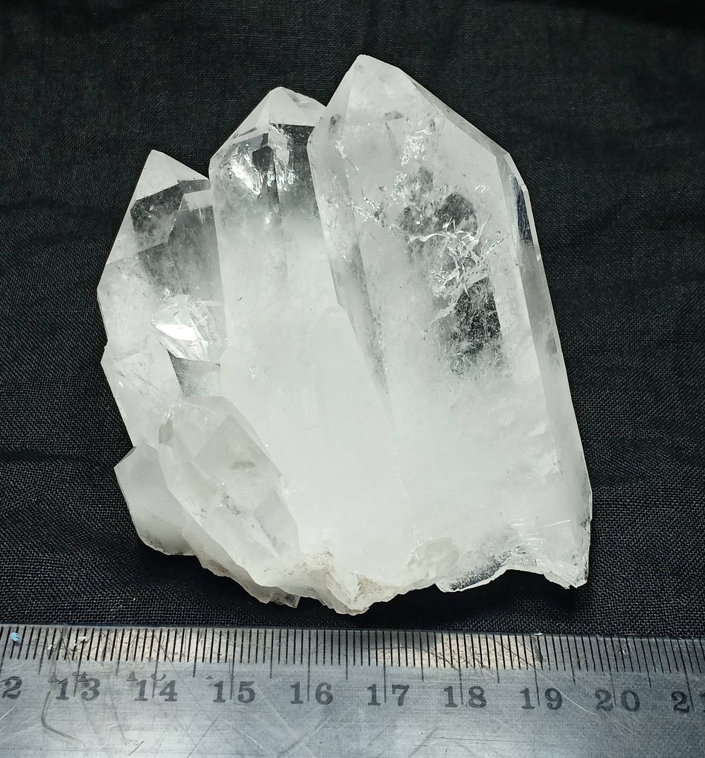 An amazing specimen of clear Terminated Quartz Crystals cluster 250 grams