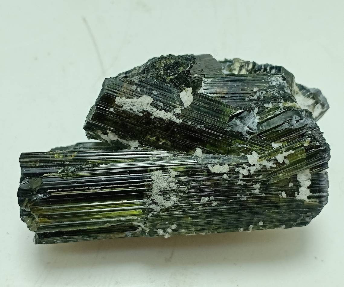 Dark green color Tourmaline crystals cluster with chatoyance effect 109 grams