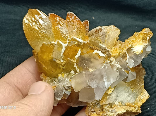 An amazing cluster of Terminated calcite crystals with Fluorite combinations 290 grams