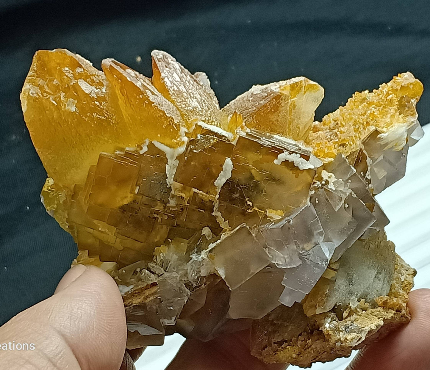An amazing cluster of Terminated calcite crystals with Fluorite combinations 290 grams