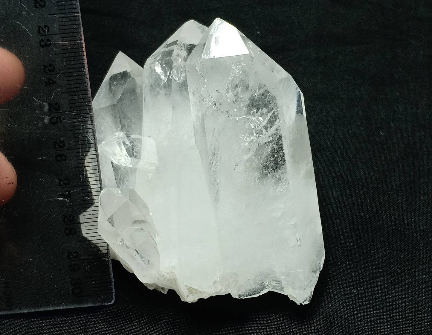 An amazing specimen of clear Terminated Quartz Crystals cluster 250 grams