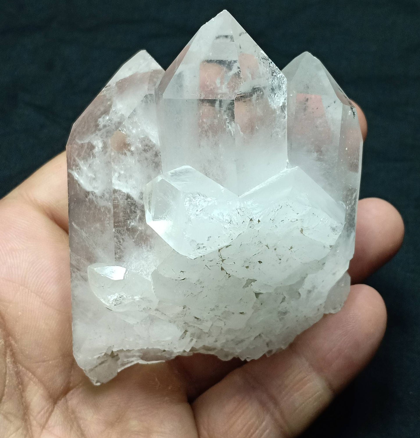 An amazing specimen of clear Terminated Quartz Crystals cluster 250 grams