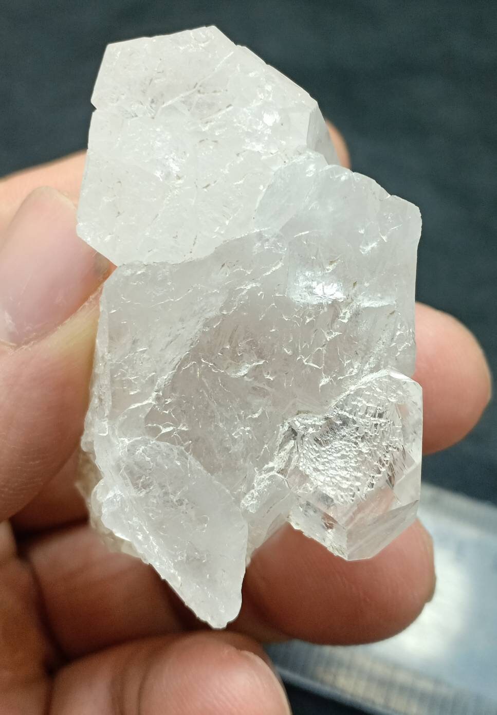 An amazing specimen of twin terminated Quartz Crystals with another small terminated Crystal attached 76 grams