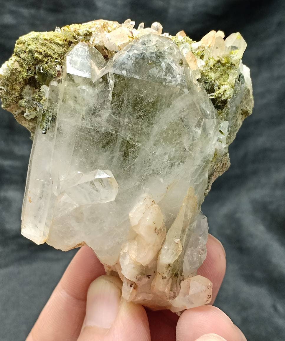 An amazing quartz and Epidote cluster with beautiful terminations 157 grams