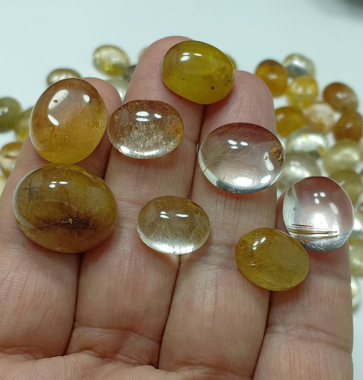An amazing lot of Rutilated Brazilian included polished quartz Cabochon 200 grams
