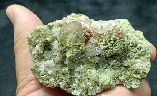 An amazing quartz and Epidote cluster with beautiful terminations 124 grams