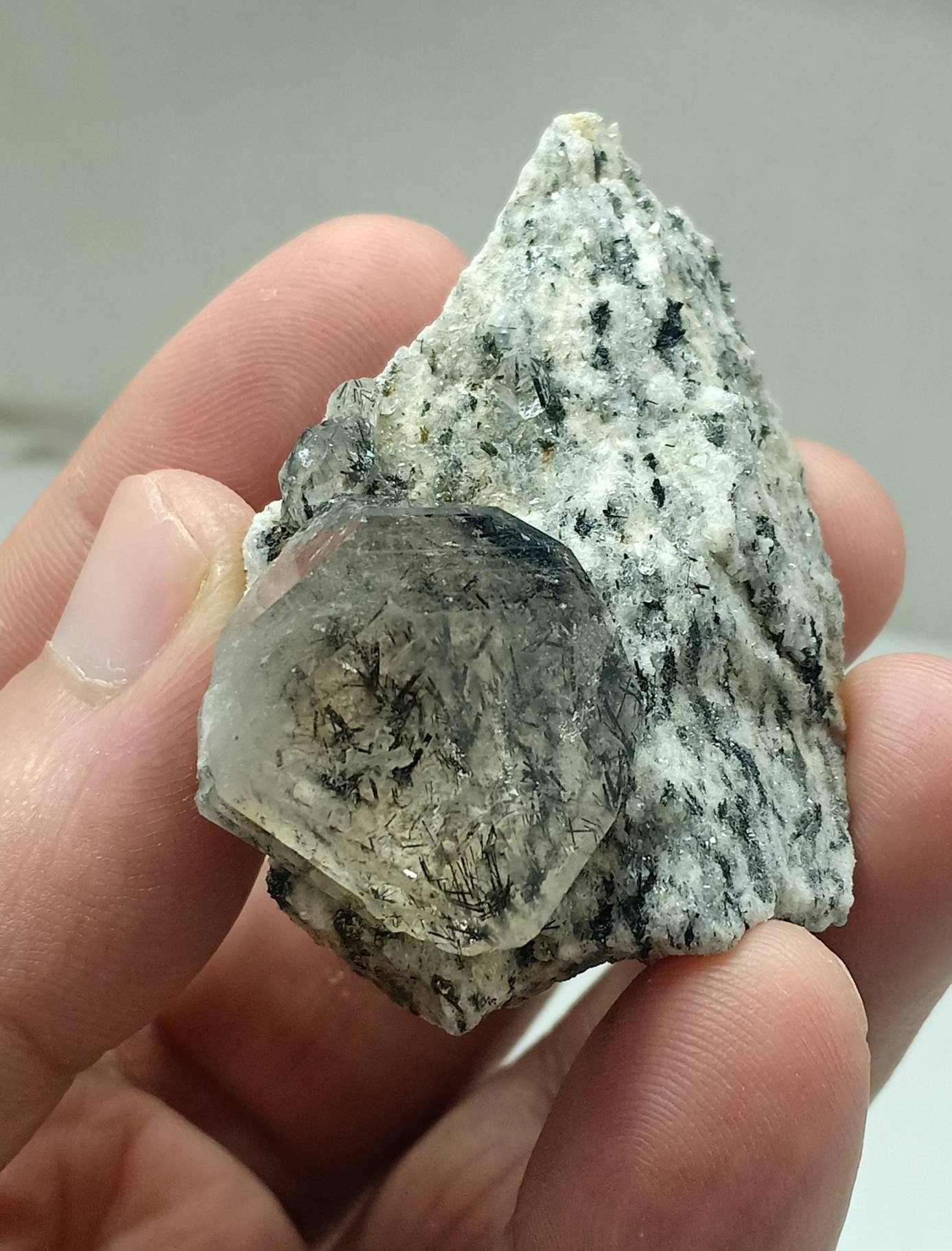 An amazing specimen of aegirine included double terminated Quartz Crystal on matrix of granite 52 grams