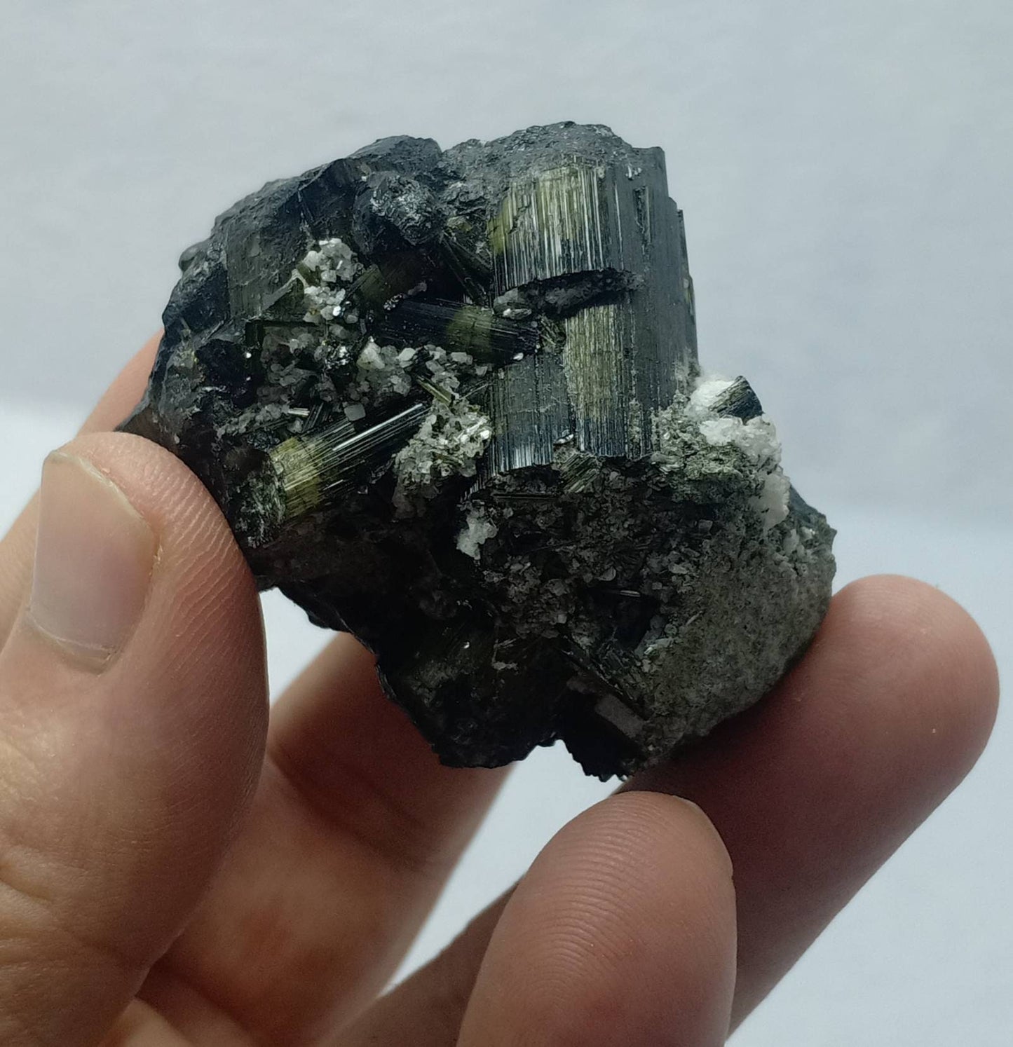Dark green color Tourmaline crystals cluster with chatoyance effect 129 grams