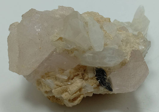 Light pink morganite with quartz and Tantalite 228 grams