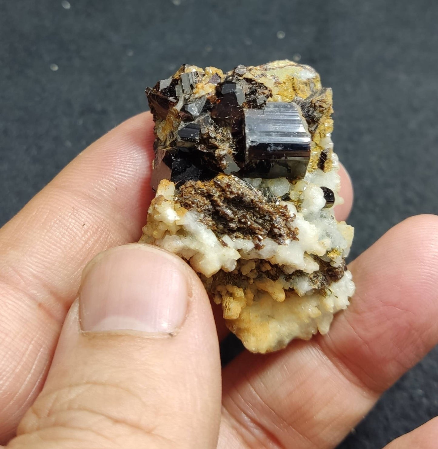 Lusterous crystal specimen of dark brown Vesuvianite on matrix 43 grams