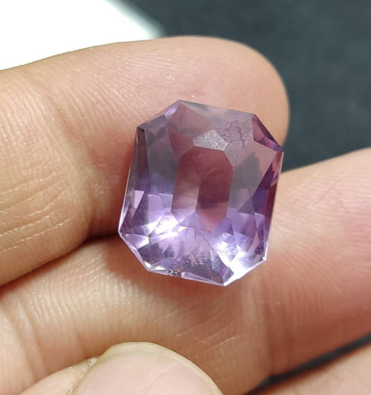 An amazing faceted modified emerald cut amethyst gemstone 13 carats