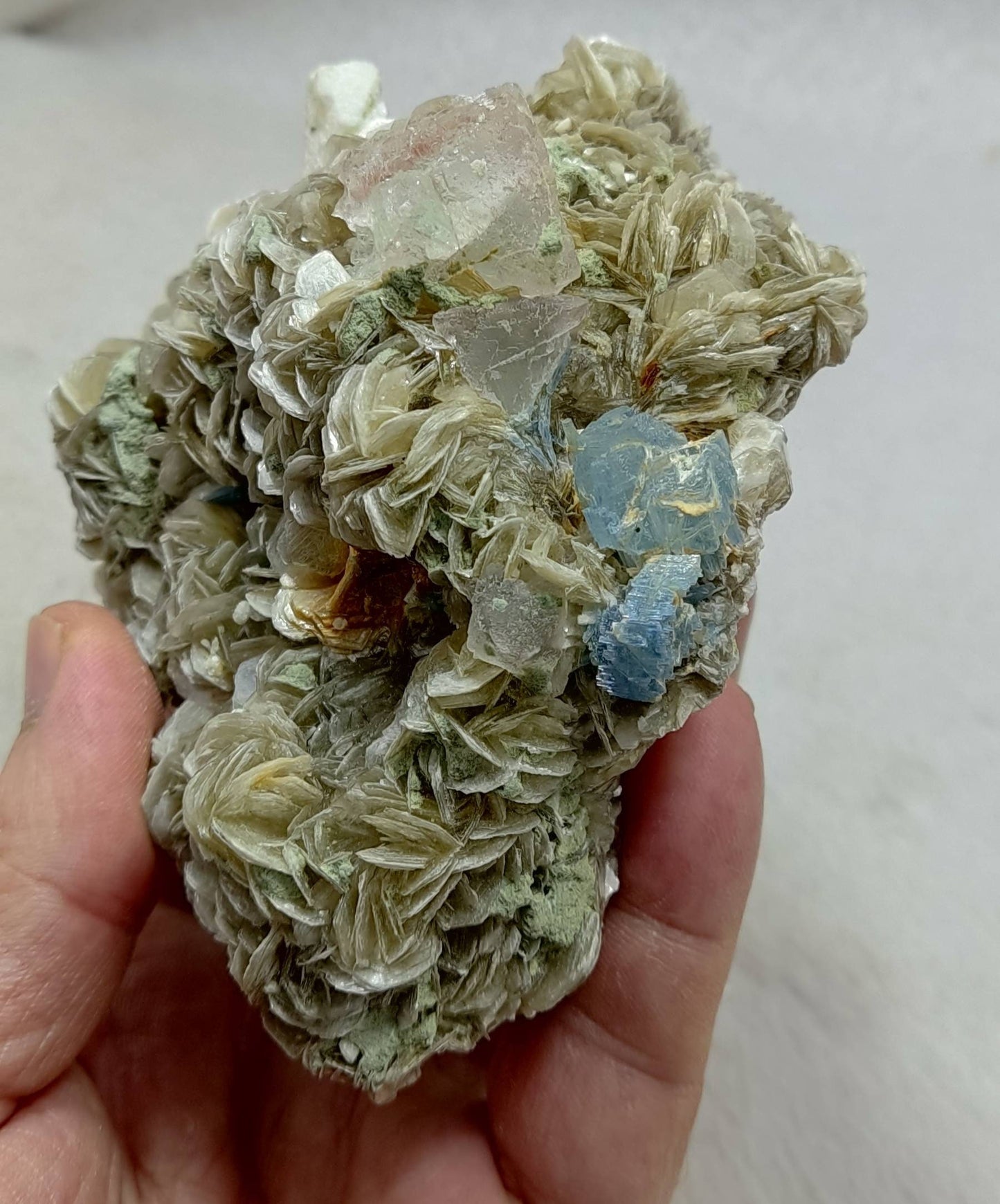Aquamarine crystal on matrix with fluorite, feldspar, surrounded by Muscovite 625 grams