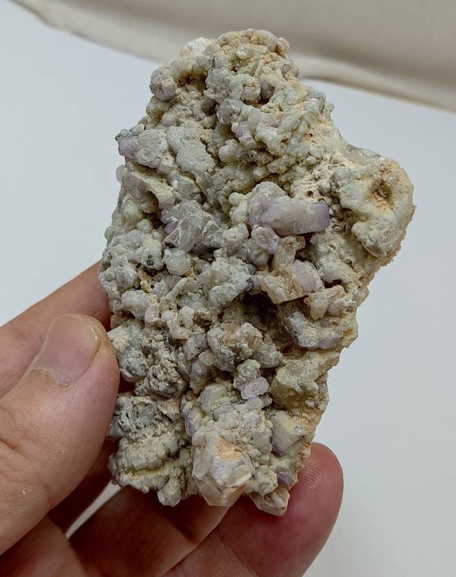 An amazing specimen of light purple Apatite crystals on matrix with quartz 179 grams