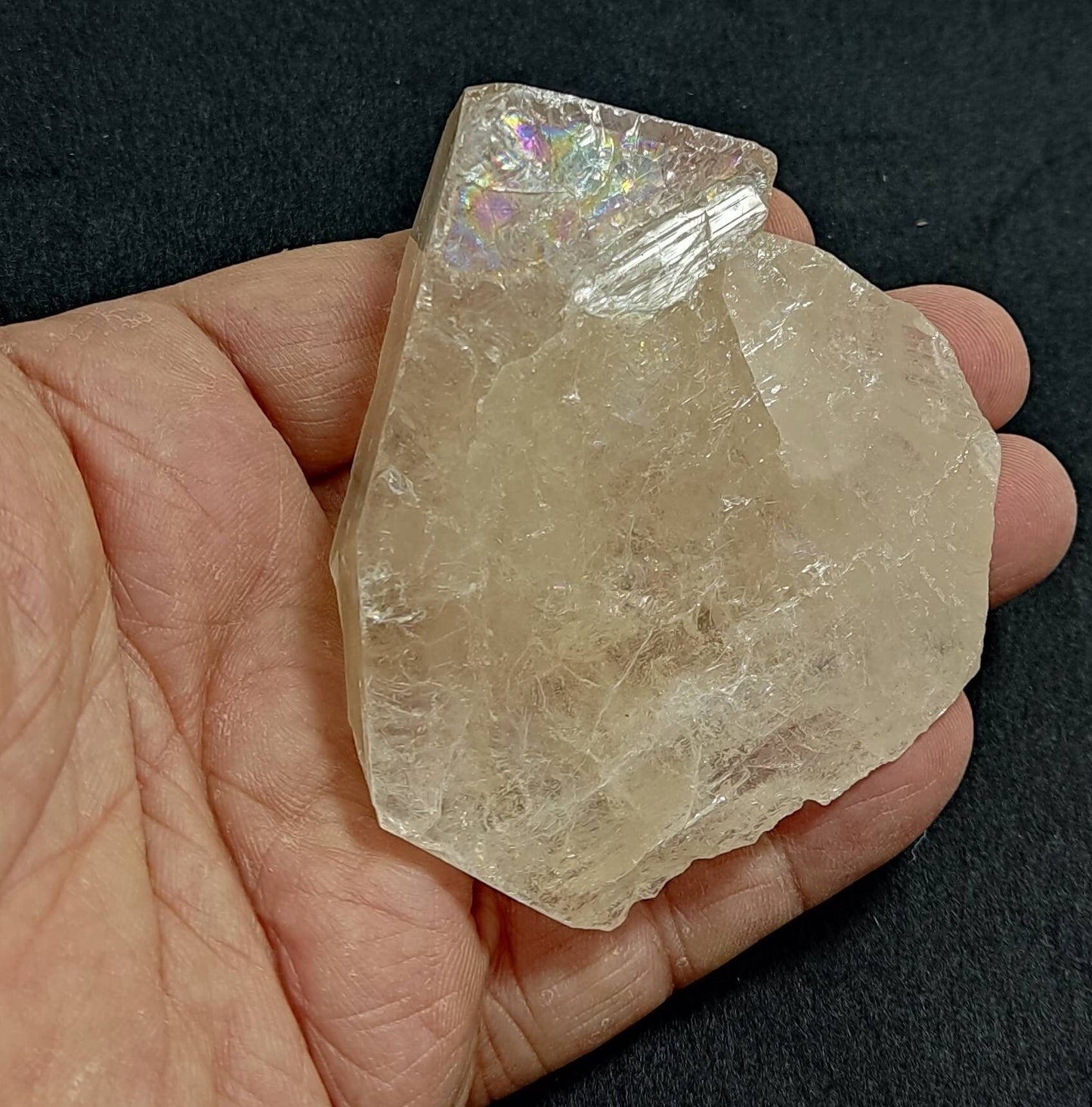 An amazing Single beautiful terminated light peach color Topaz crystal with rainbow effects 200 grams