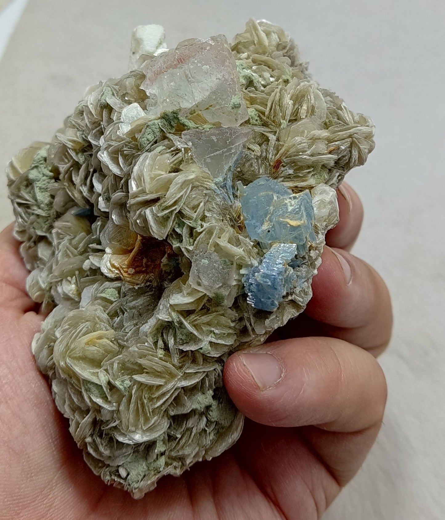 Aquamarine crystal on matrix with fluorite, feldspar, surrounded by Muscovite 625 grams