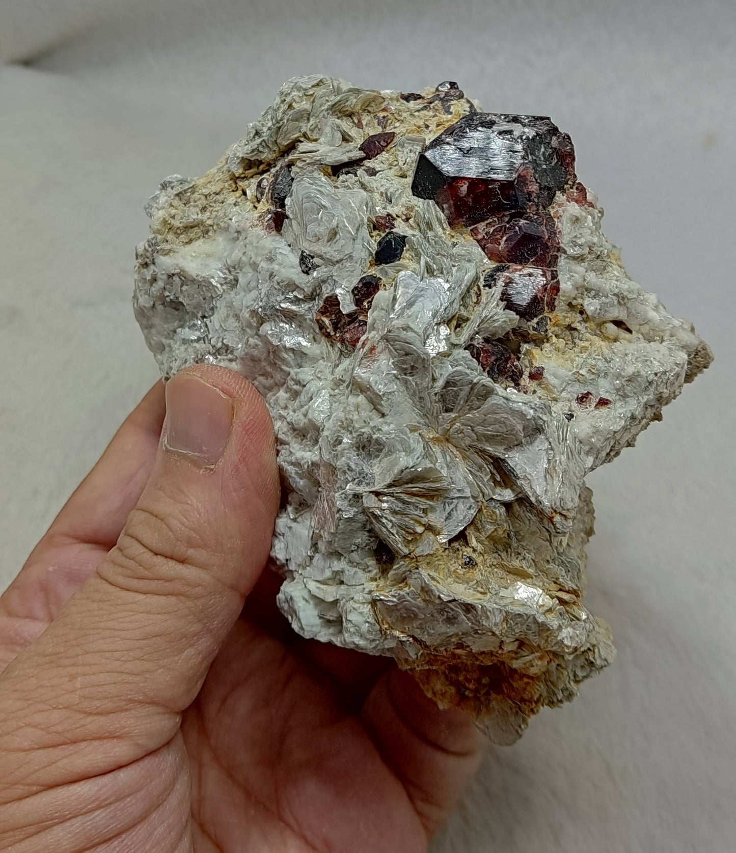 An amazing beautiful specimen of spessartine Garnet crystals on matrix with mica 580 grams