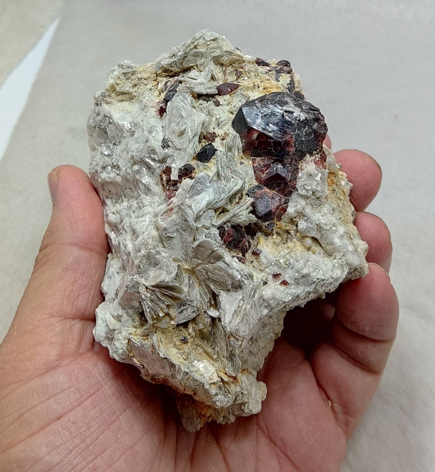 An amazing beautiful specimen of spessartine Garnet crystals on matrix with mica 580 grams