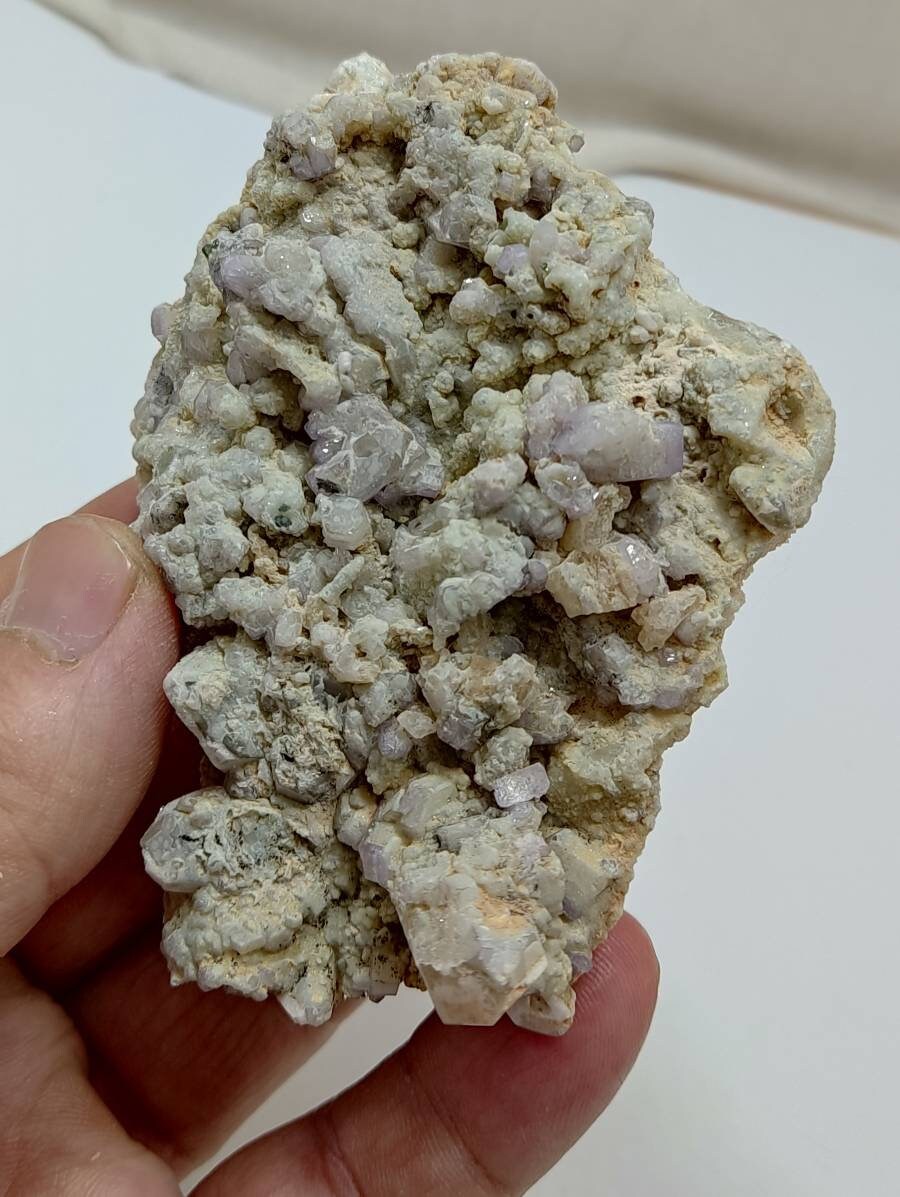 An amazing specimen of light purple Apatite crystals on matrix with quartz 179 grams