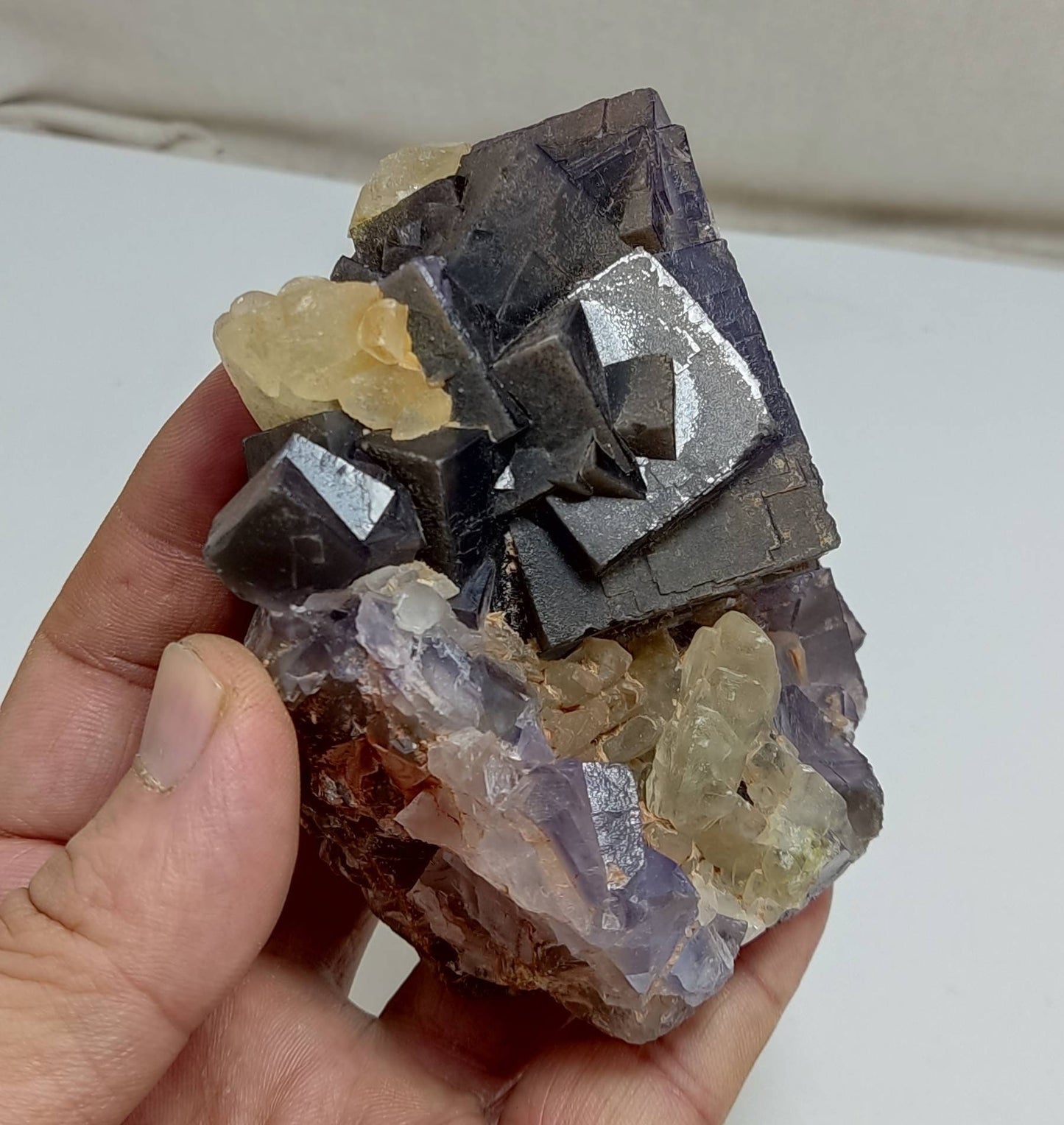An amazing Single beautiful dark purple color fluorite specimen with associated dogtooth calcite 588 grams
