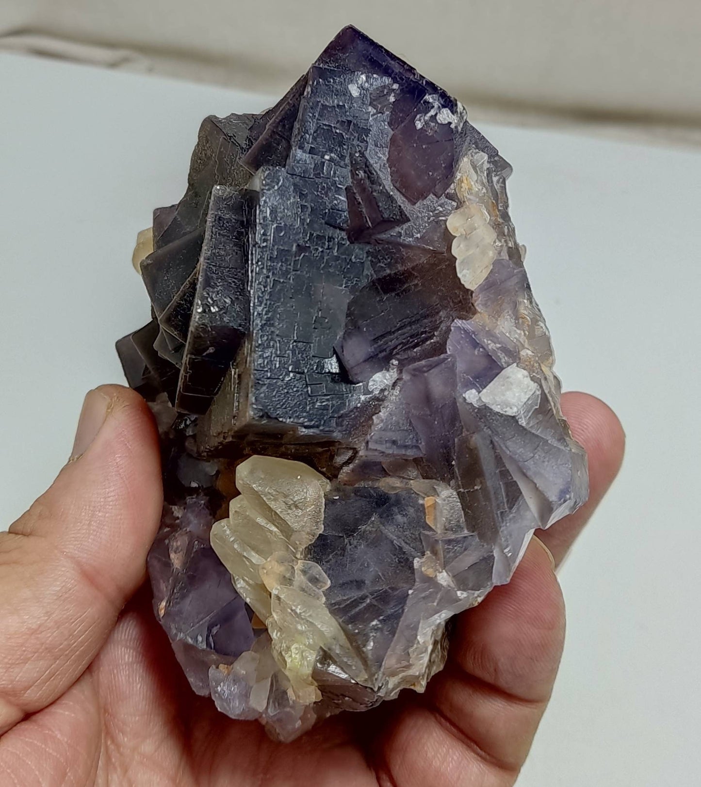 An amazing Single beautiful dark purple color fluorite specimen with associated dogtooth calcite 588 grams