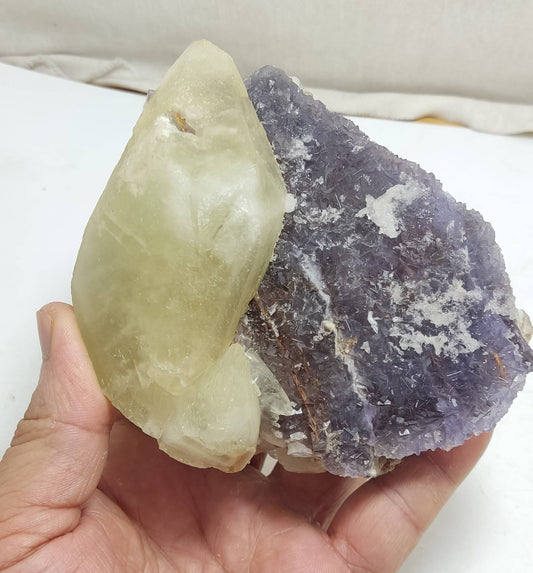 Double terminated calcite crystal on matrix with purple cubic Fluorite crystals 830 grams