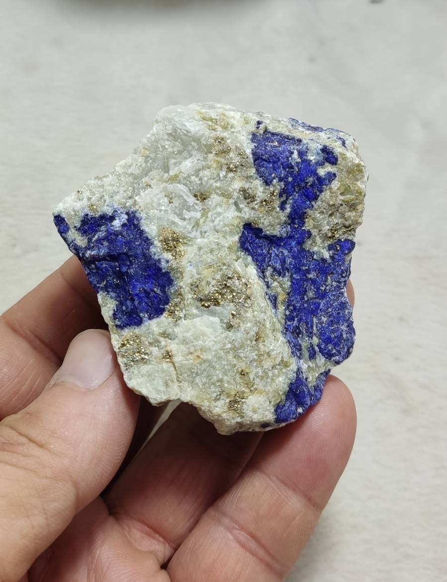 Amazing specimen of fluorescent Lazurite on matrix with pyrite 173 grams