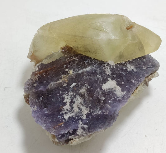 Double terminated calcite crystal on matrix with purple cubic Fluorite crystals 830 grams