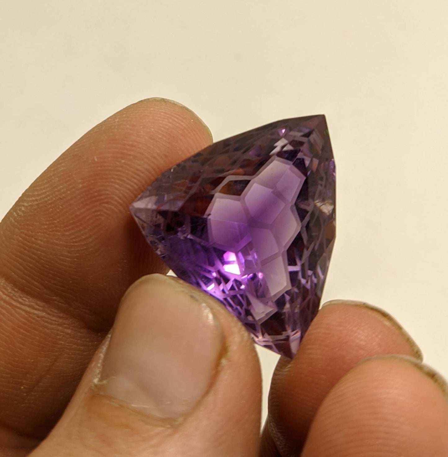 An amazing trillion fancy cut faceted amethyst gemstone 46 carats