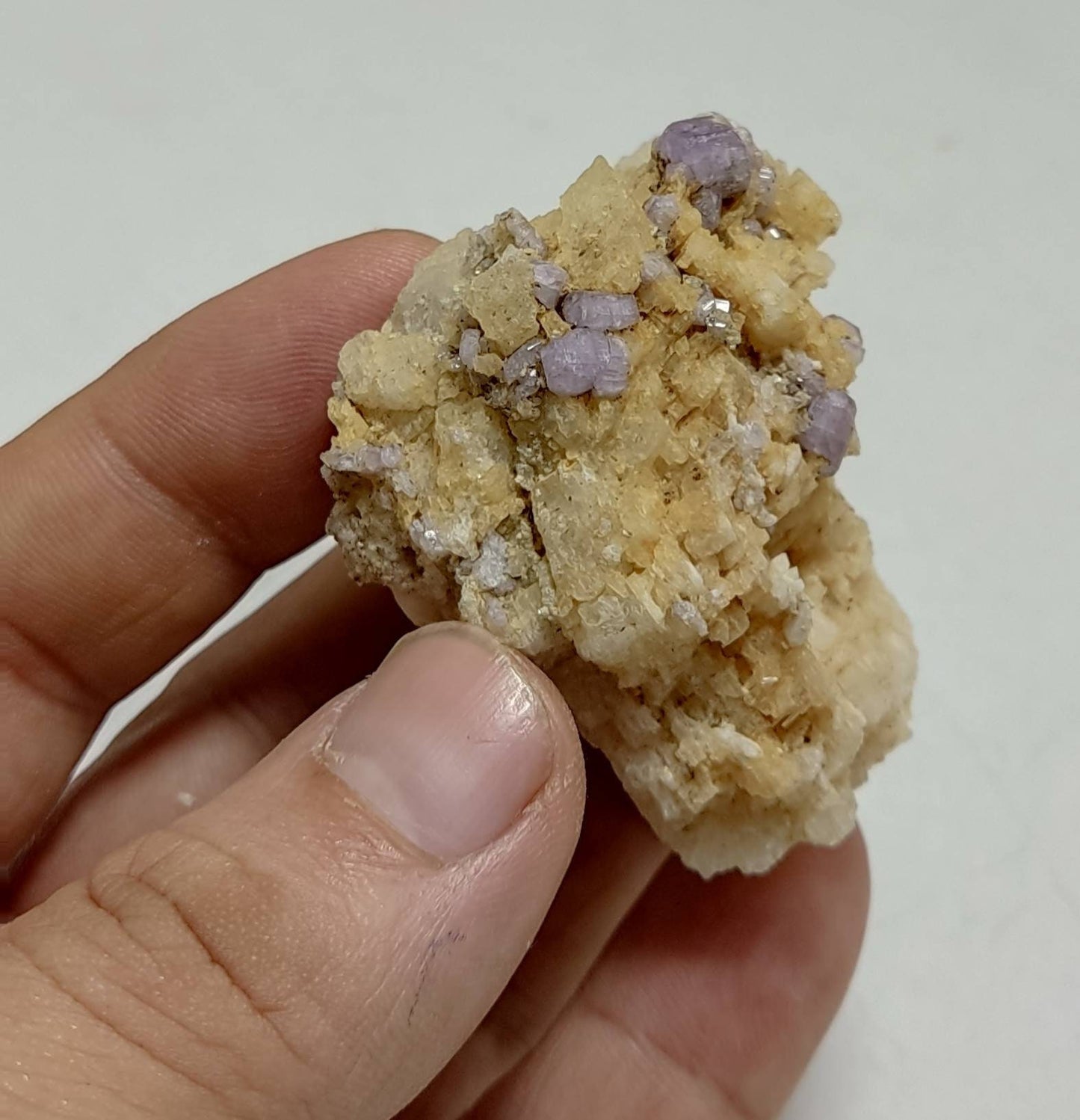 An amazing specimen of purple Apatite crystals on matrix 69 grams