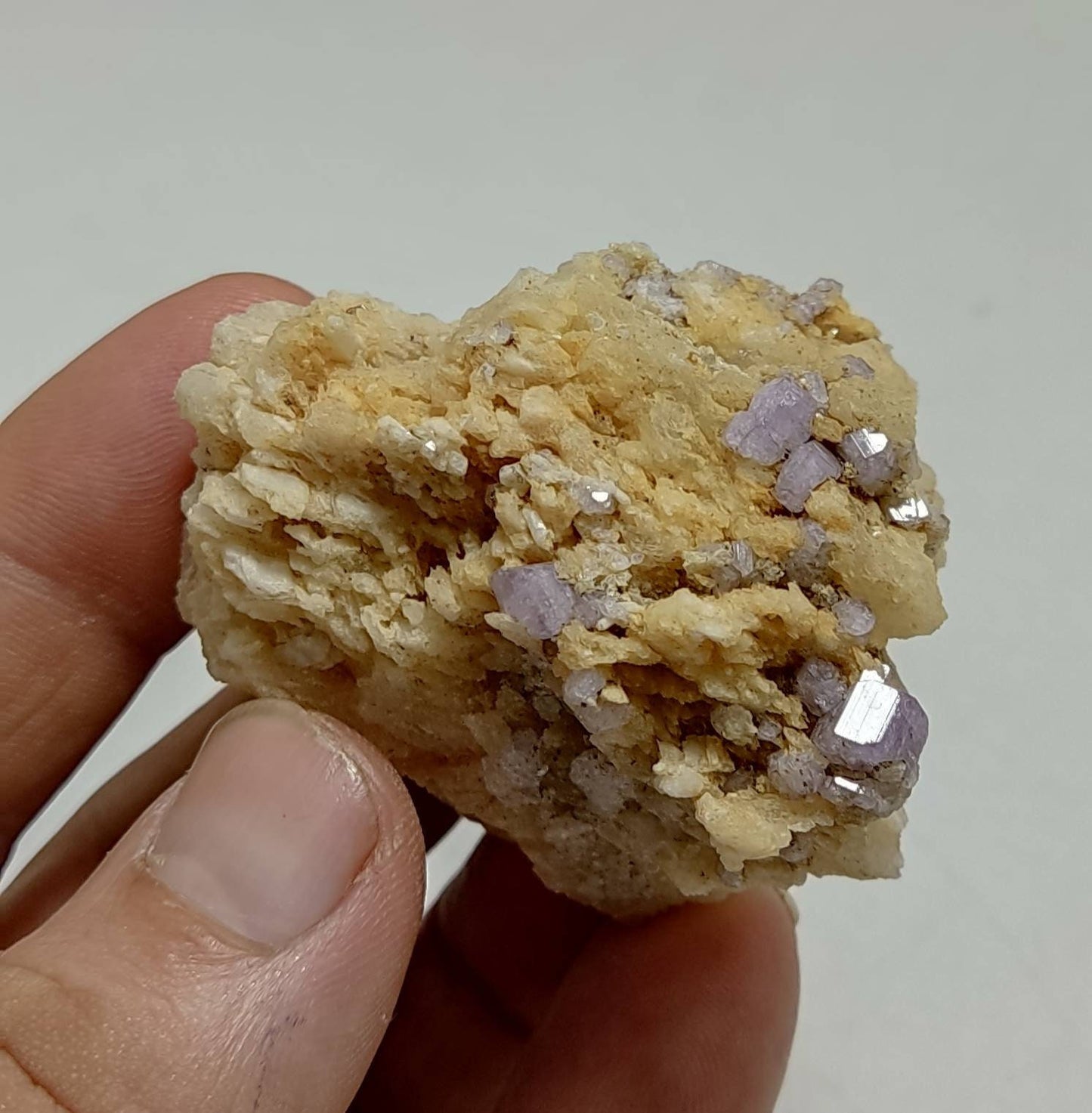 An amazing specimen of purple Apatite crystals on matrix 69 grams