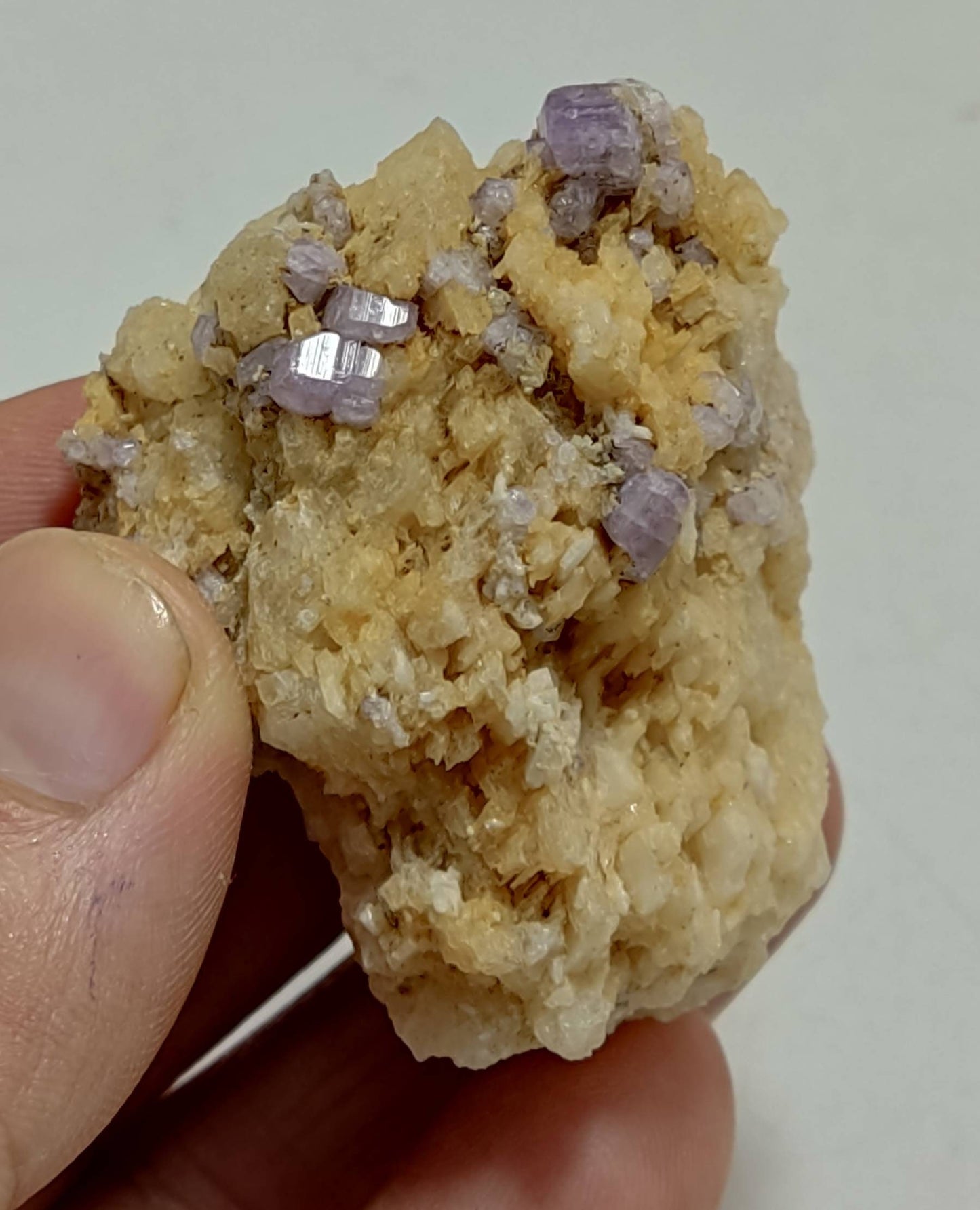 An amazing specimen of purple Apatite crystals on matrix 69 grams