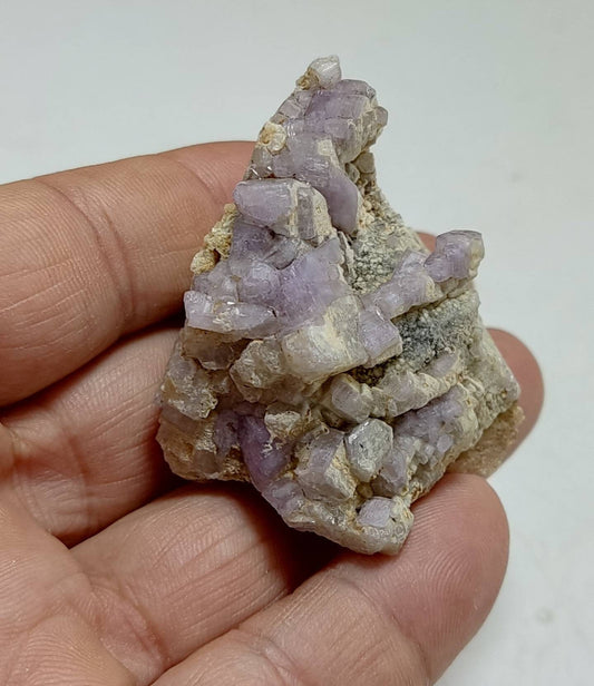 An amazing specimen of purple Apatite crystals on matrix 57 grams