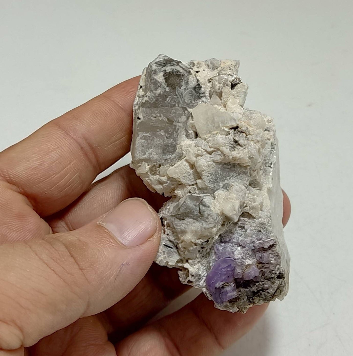 An amazing specimen of purple Apatite crystals on matrix 120 grams