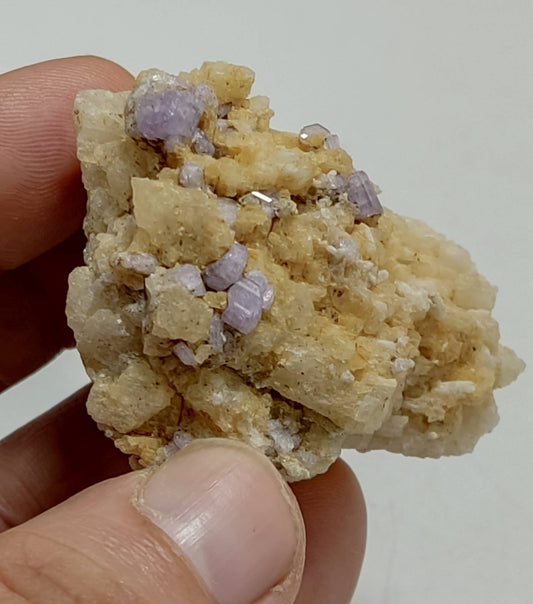 An amazing specimen of purple Apatite crystals on matrix 69 grams