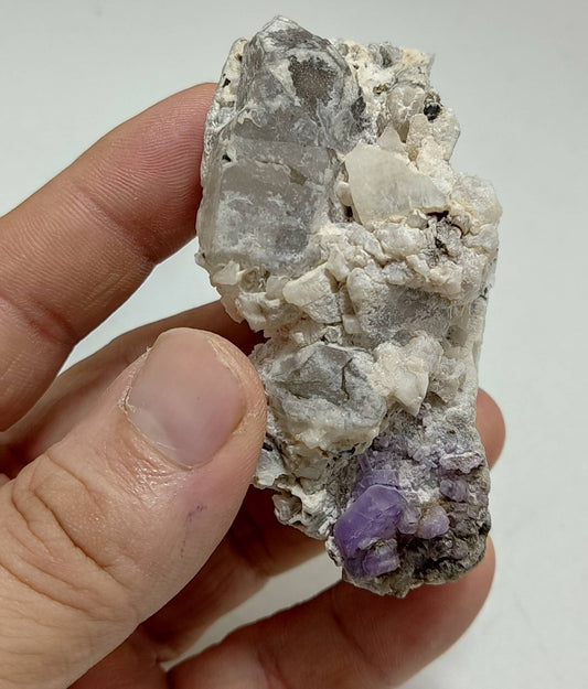 An amazing specimen of purple Apatite crystals on matrix 120 grams