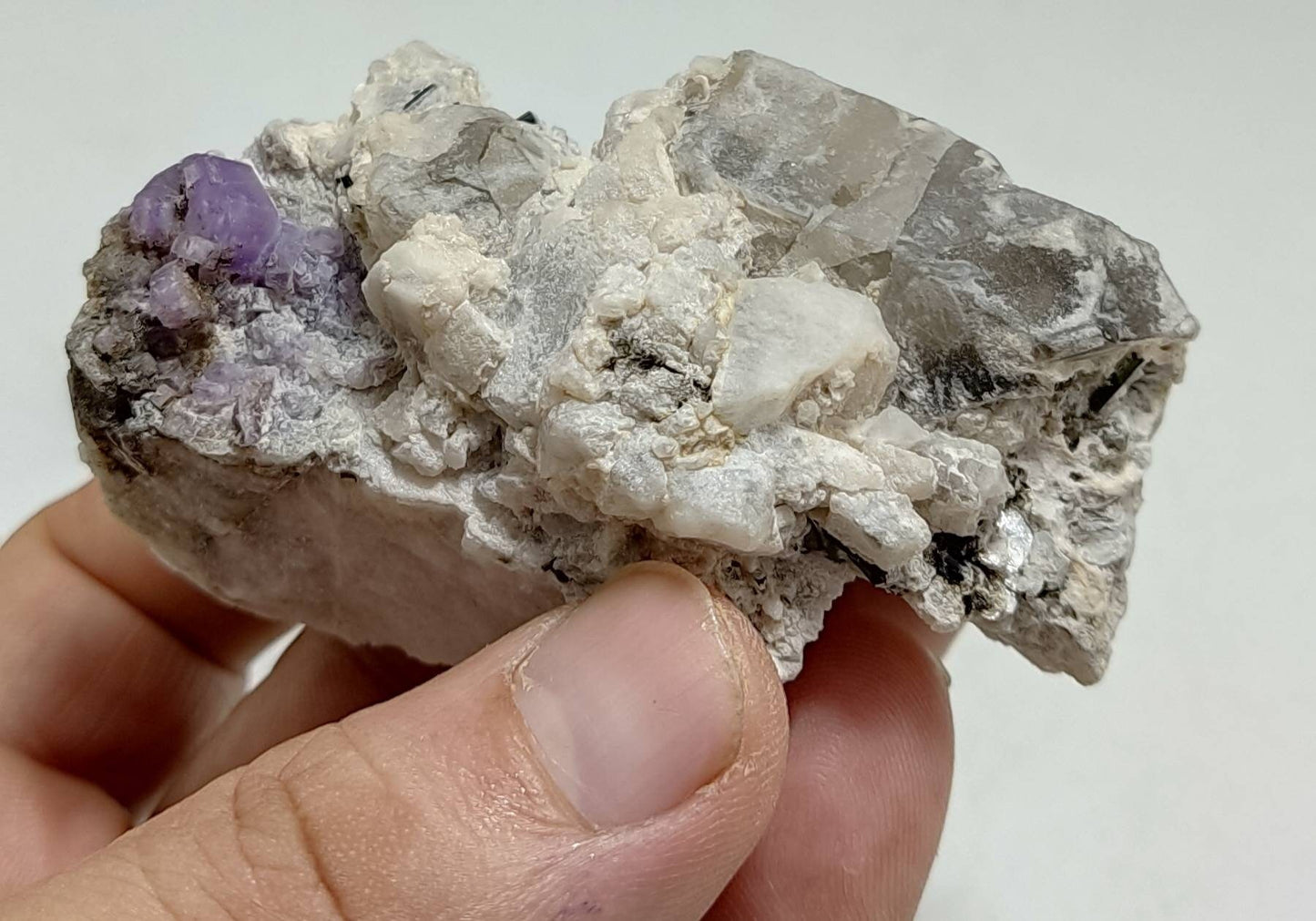 An amazing specimen of purple Apatite crystals on matrix 120 grams